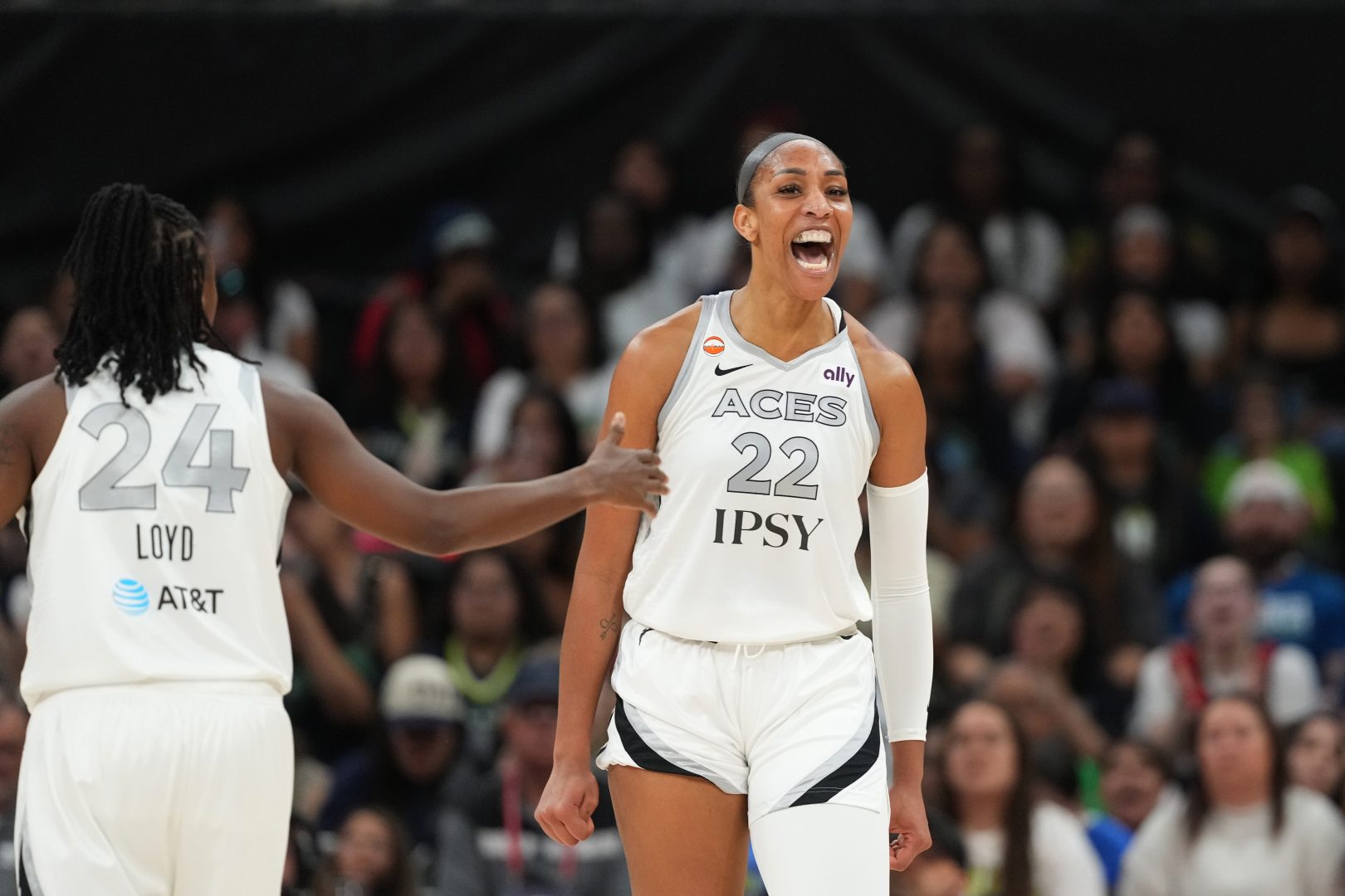 A’ja Wilson reacts after scoring through contact against the Dallas Wings during a Las Vegas Aces preseason game at Moody Center.