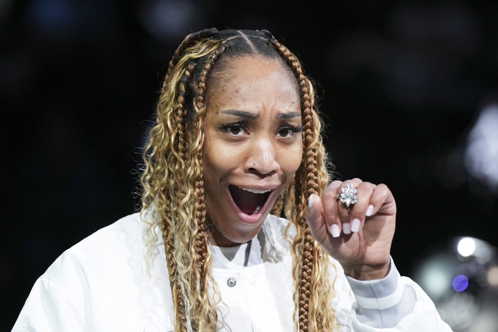 A’ja Wilson reacts while receiving her 2025 WNBA championship ring before the Las Vegas Aces’ season opener against the Phoenix Mercury.