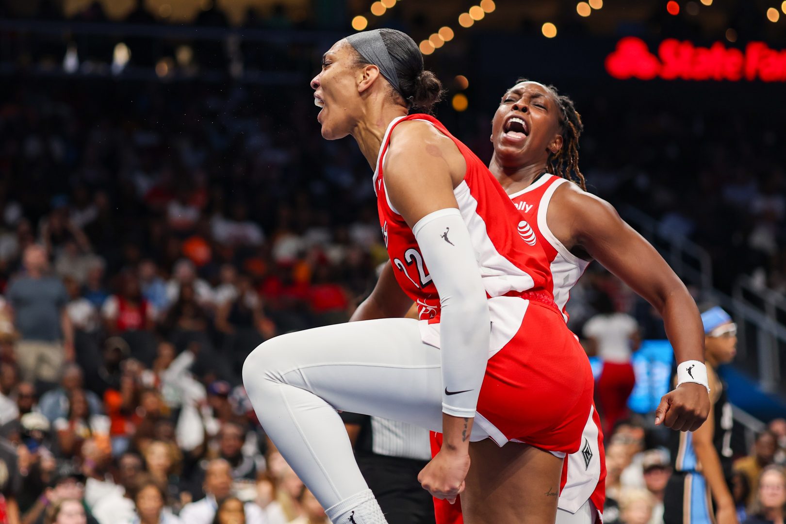 A’ja Wilson reacts after scoring for the Las Vegas Aces against the Atlanta Dream at State Farm Arena.