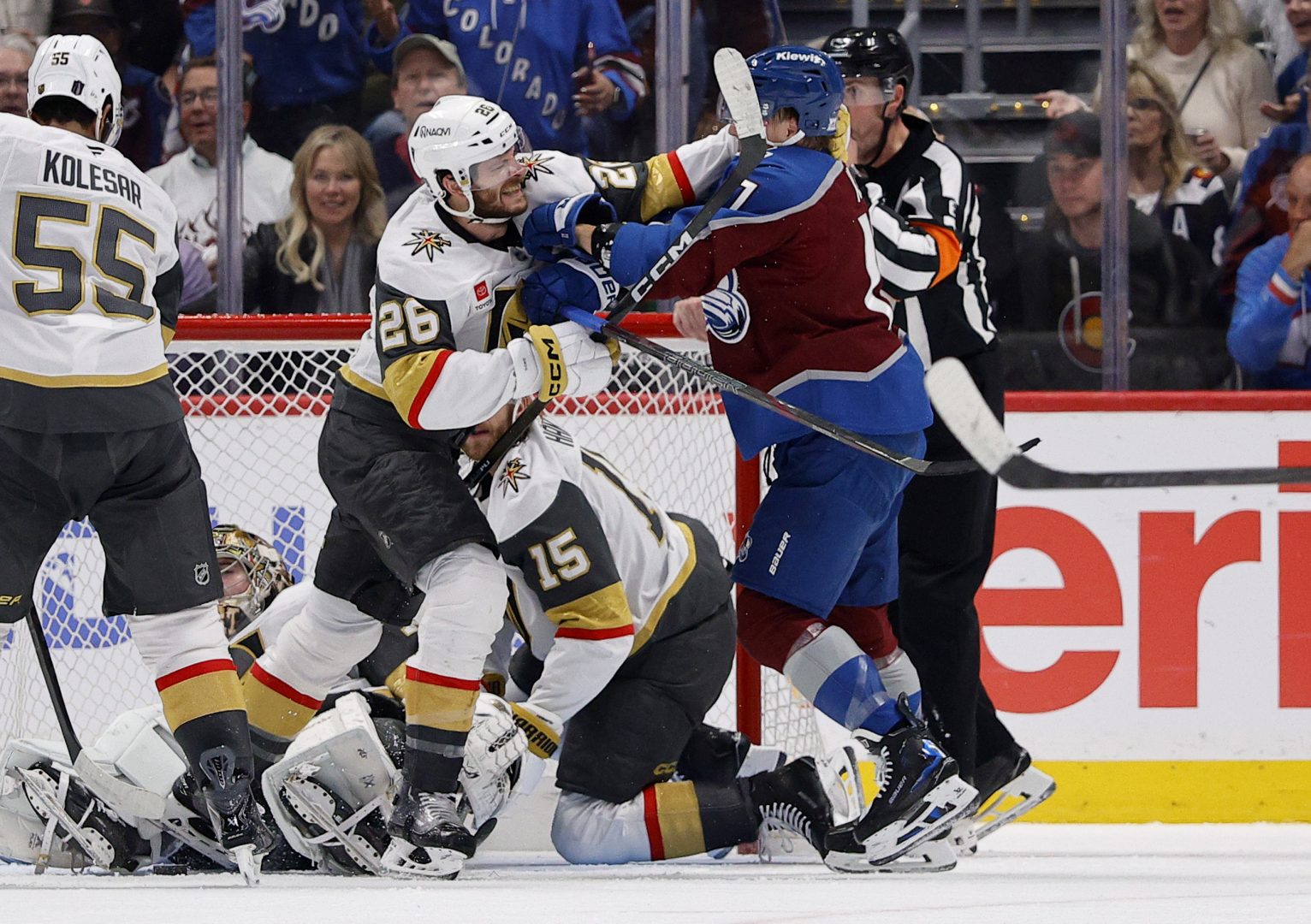 Nic Dowd of the Vegas Golden Knights scuffles with Parker Kelly of the Colorado Avalanche during Game 1 of the Western Conference Final at Ball Arena.