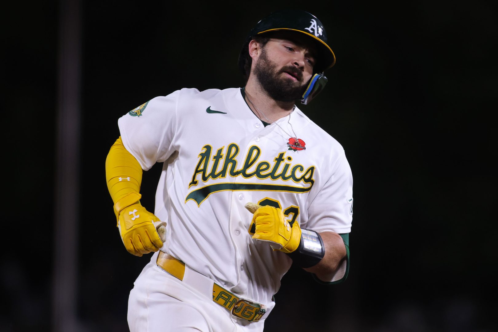 Shea Langeliers jogs around the bases after hitting a solo home run against the Seattle Mariners.