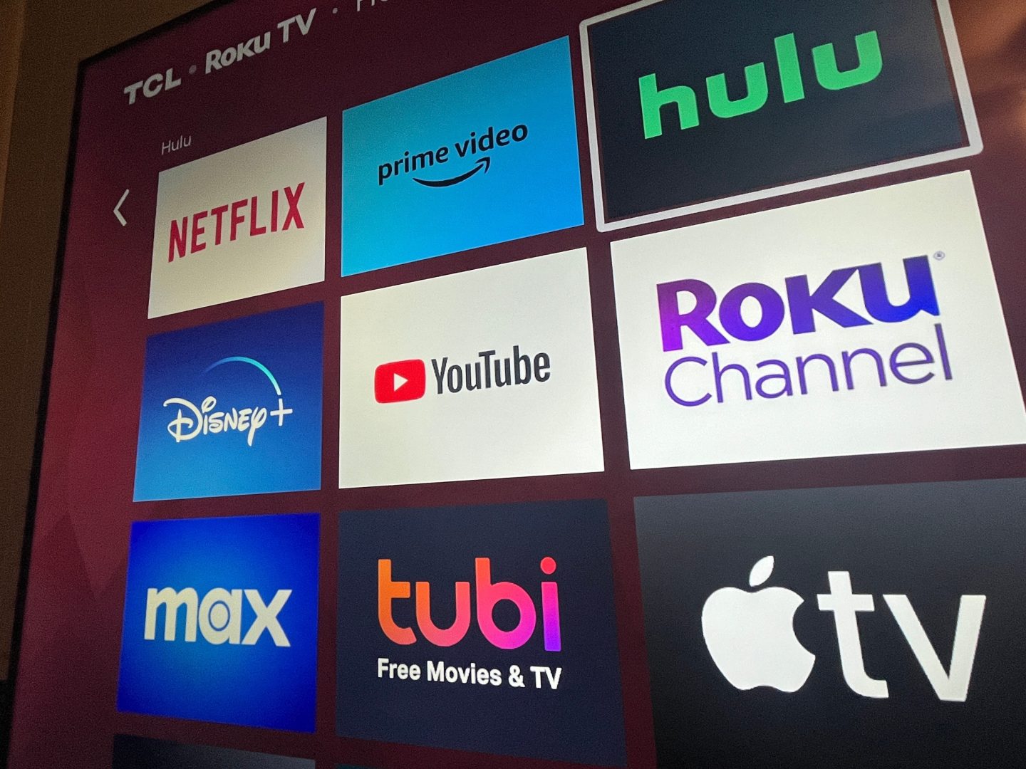 Multiple streaming services appear on a Roku TV