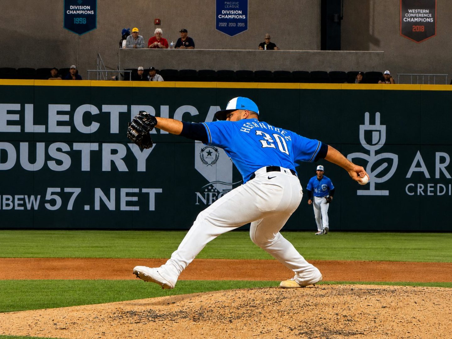 Nick Hernandez pitches from the mound during a game at Las Vegas Ballpark, captured mid-delivery in his blue Aviators uniform.