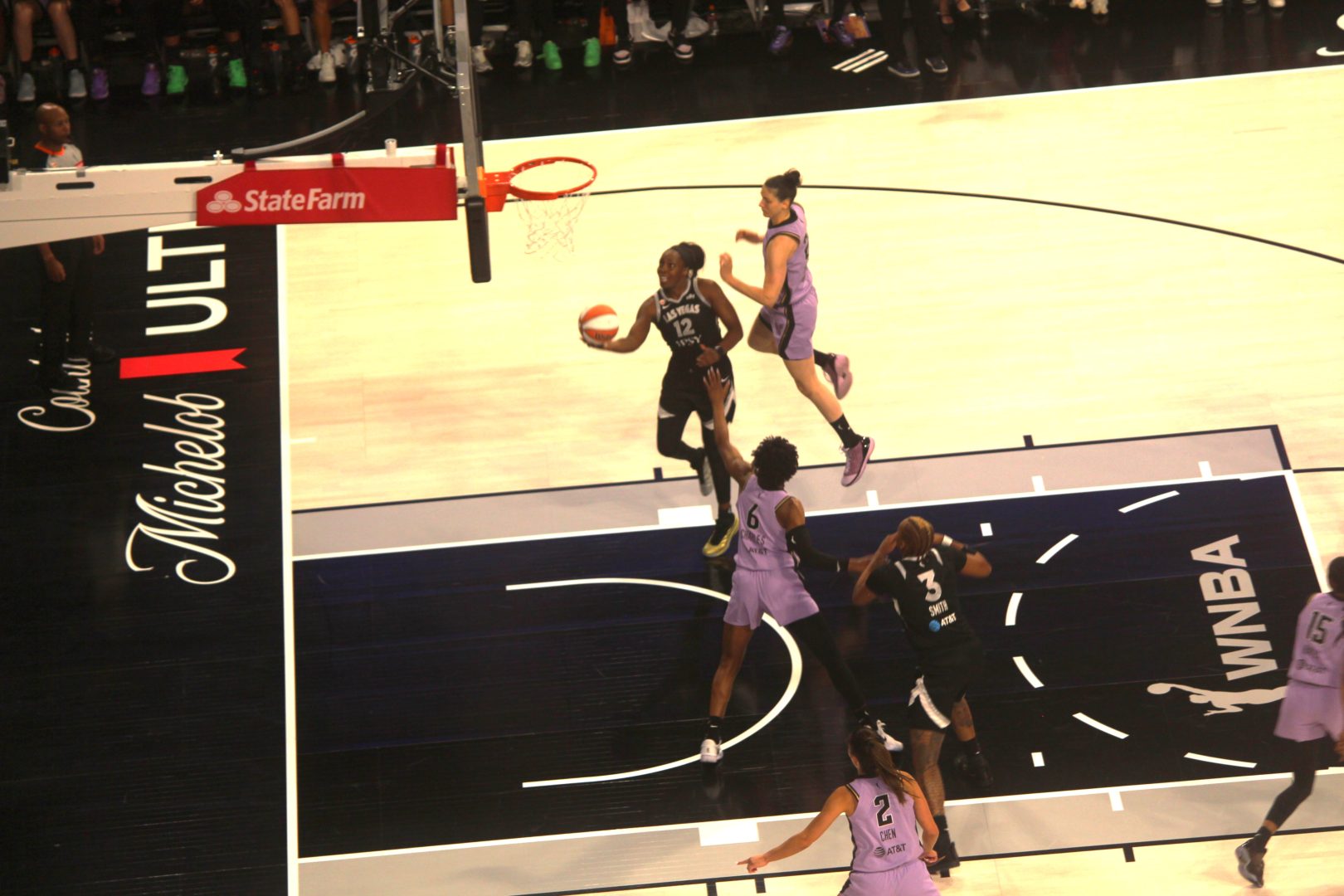 Chelsea Gray drives for a scoop shot against the Golden State Valkyries at Michelob ULTRA Arena.