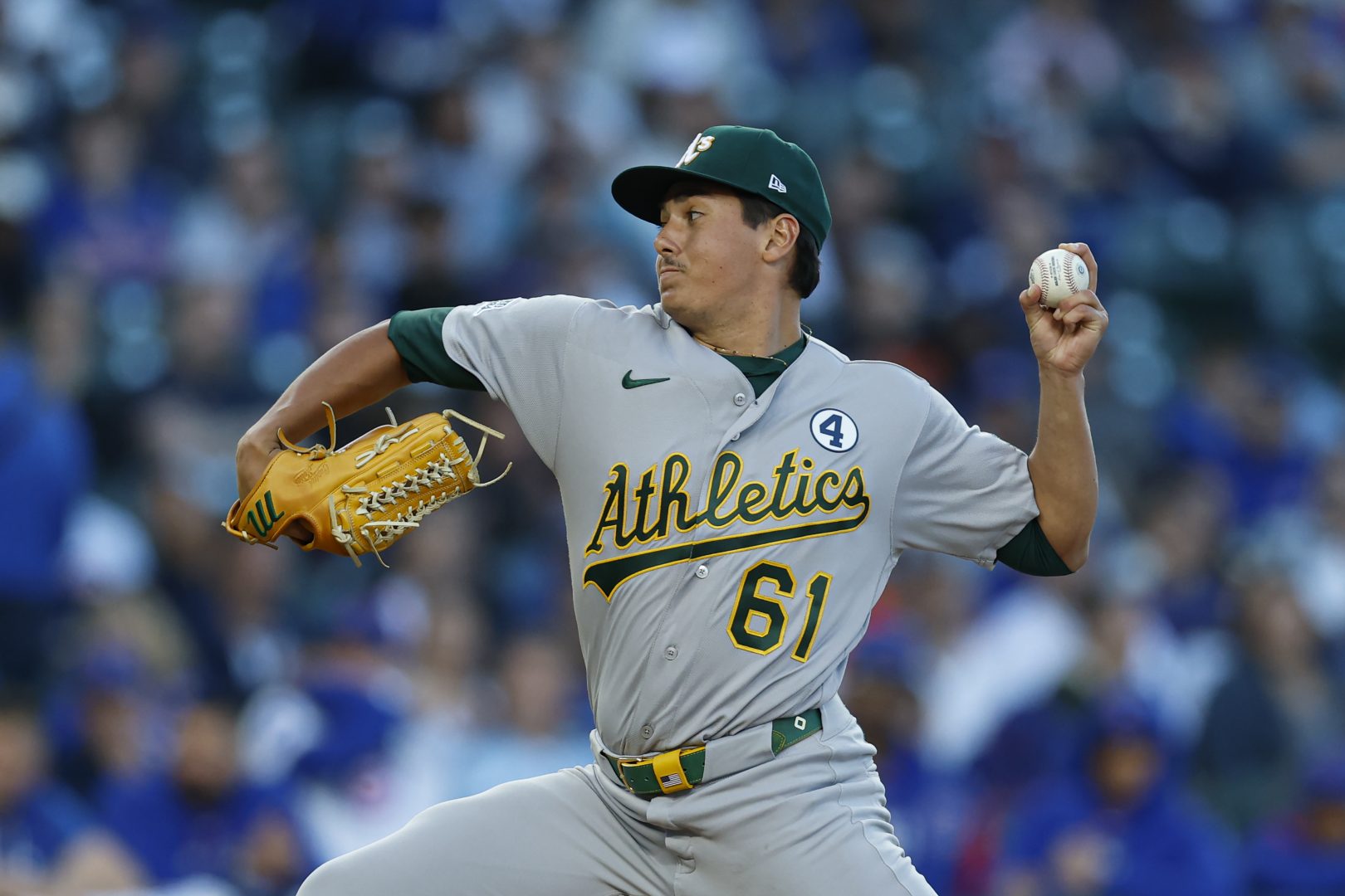 Athletics pitcher Gage Jump delivers a pitch during the first inning against the Chicago Cubs at Wrigley Field.