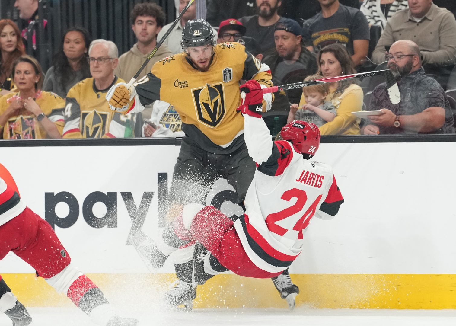 Vegas Golden Knights center Brett Howden checks Carolina Hurricanes right wing Seth Jarvis during Game 4 of the 2026 Stanley Cup Final.