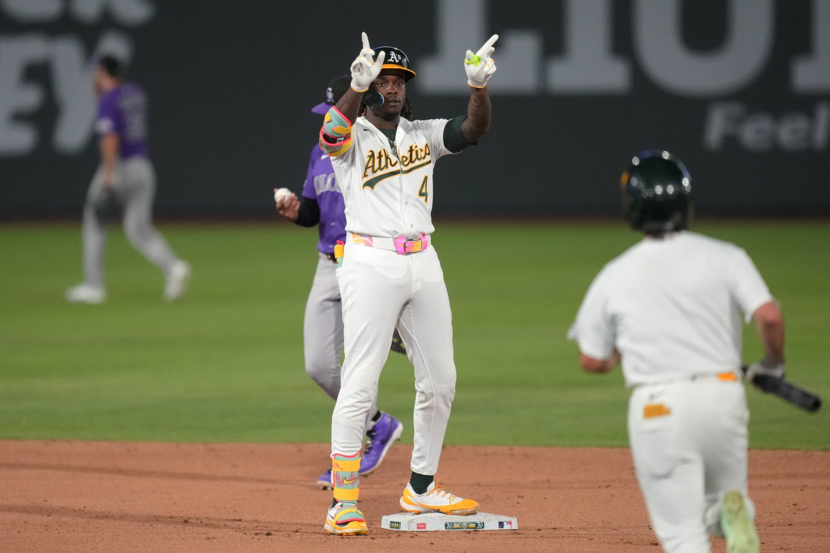 Athletics outfielder Lawrence Butler reacts after hitting a late double against the Colorado Rockies at Las Vegas Ballpark.