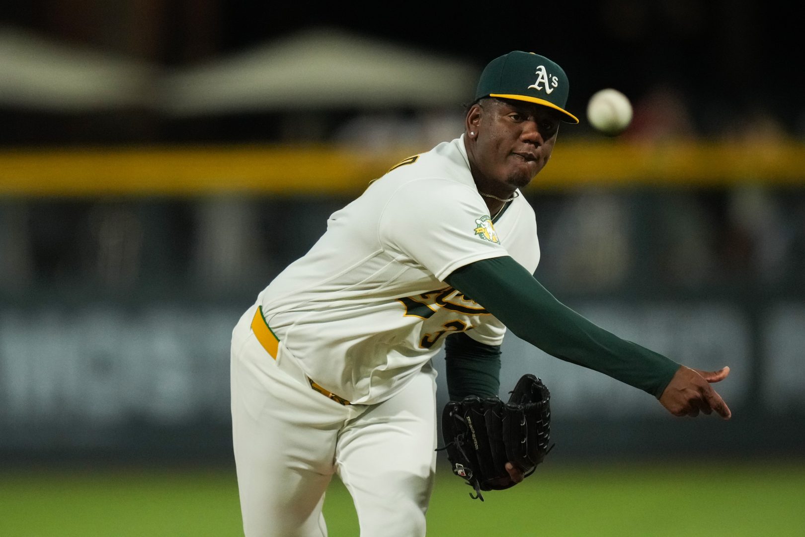 Athletics reliever Elvis Alvarado pitches in the ninth inning against the Colorado Rockies at Las Vegas Ballpark.