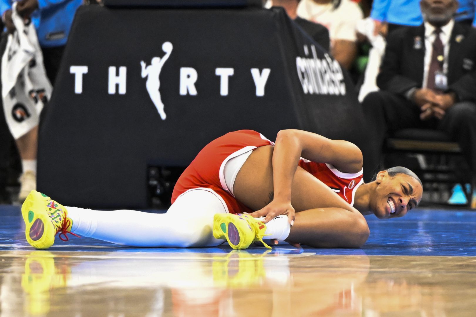 A’ja Wilson grimaces after falling during the second half against the Chicago Sky.