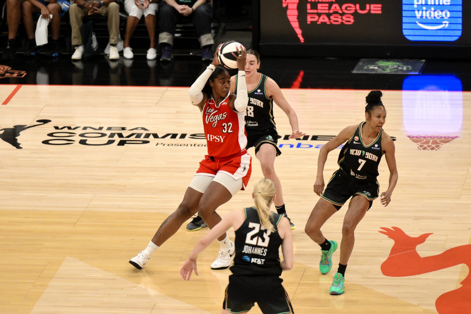 Cheyenne Parker-Tyus looks to pass as Pauline Astier defends during the first half.