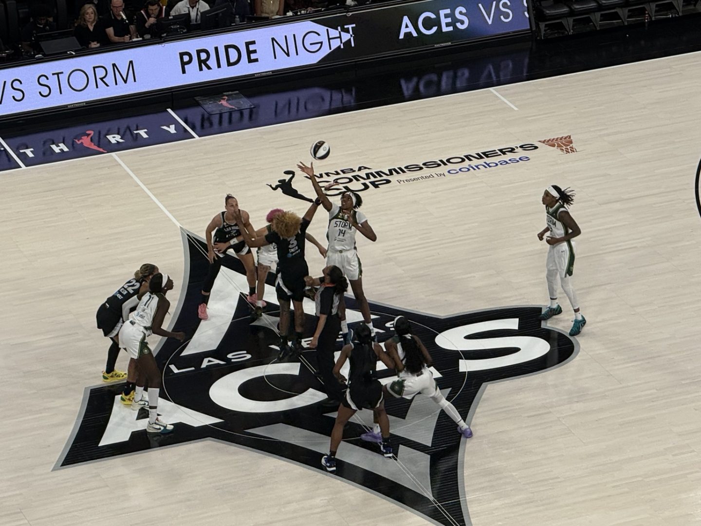 NaLyssa Smith and Dominique Malonga jump for the opening tip between the Las Vegas Aces and Seattle Storm on Pride Night at Michelob ULTRA Arena.