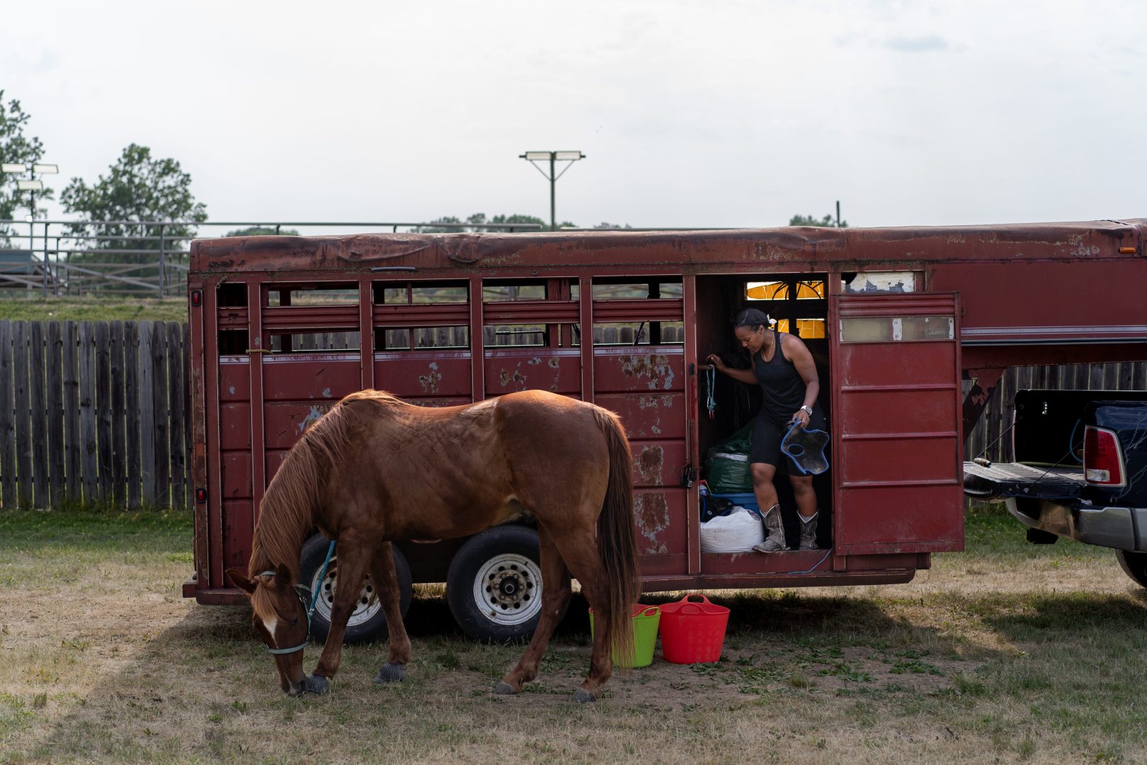 horses get ready to take part in the second day of competing during barrel races