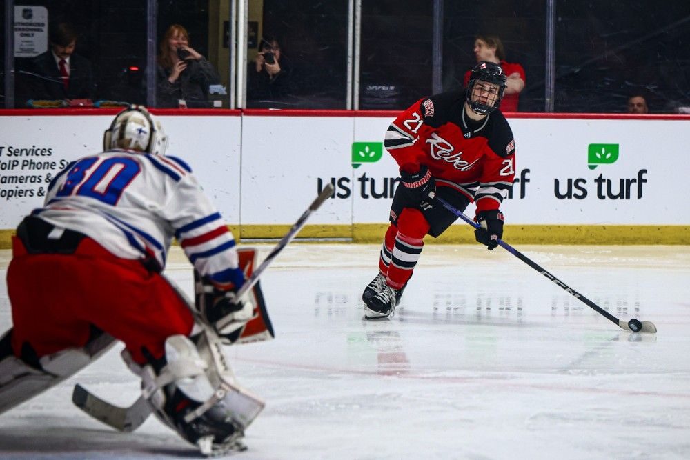 UNLV Hockey forward Tristan Rand skates with the puck toward the Arizona net during a game against the University of Arizona.
