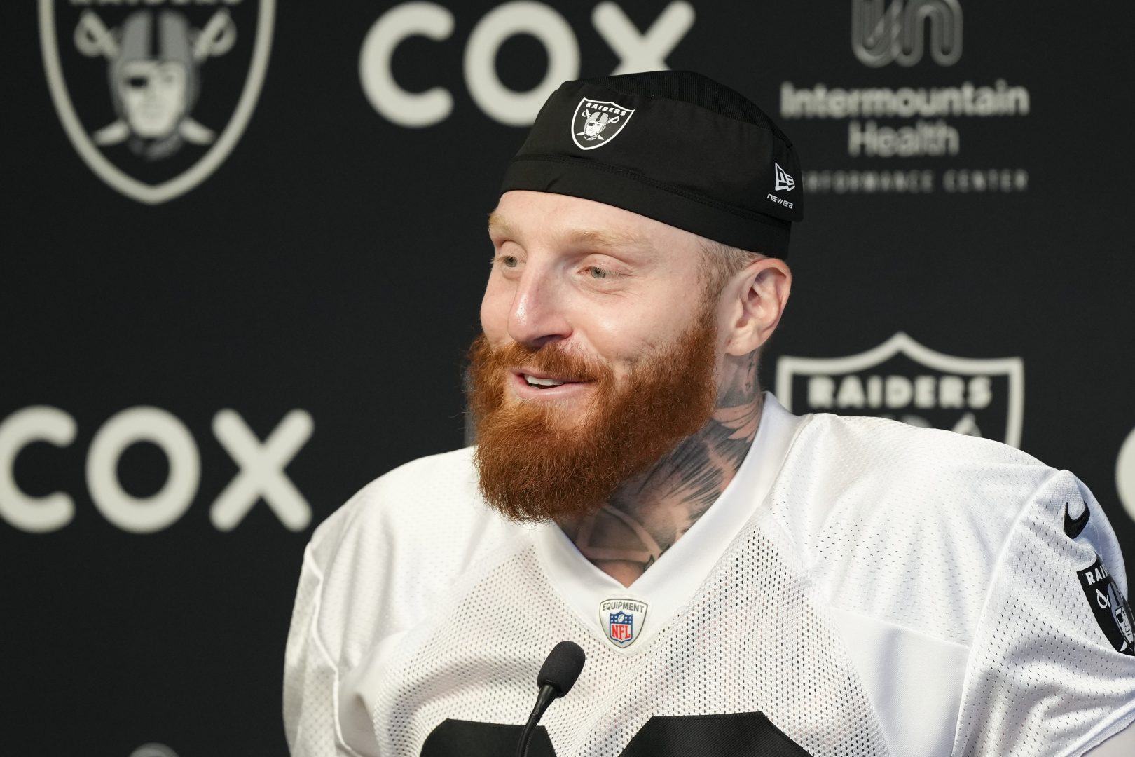 Maxx Crosby speaks during a Raiders news conference at Intermountain Health Performance Center.