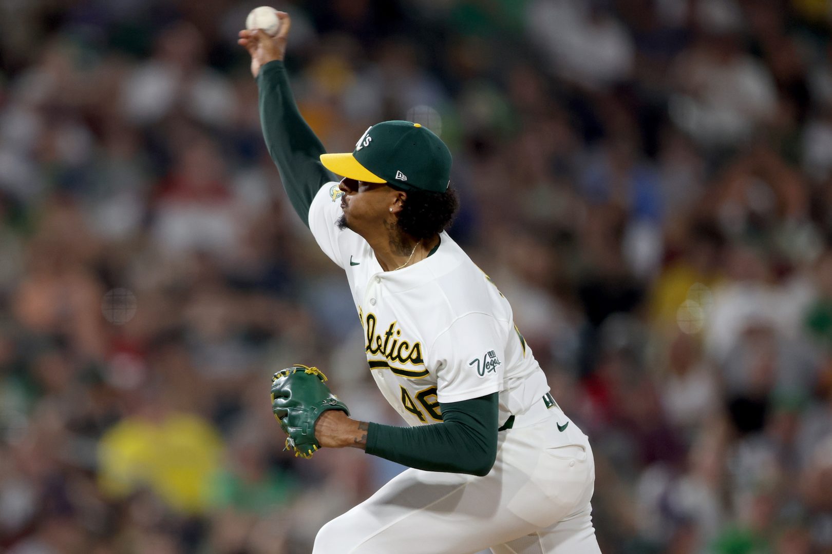 Athletics pitcher Luis Medina throws against the Boston Red Sox during the eighth inning at Sutter Health Park