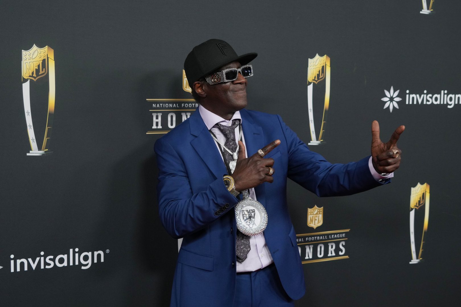 Flavor Flav on the red carpet before Super Bowl LIX