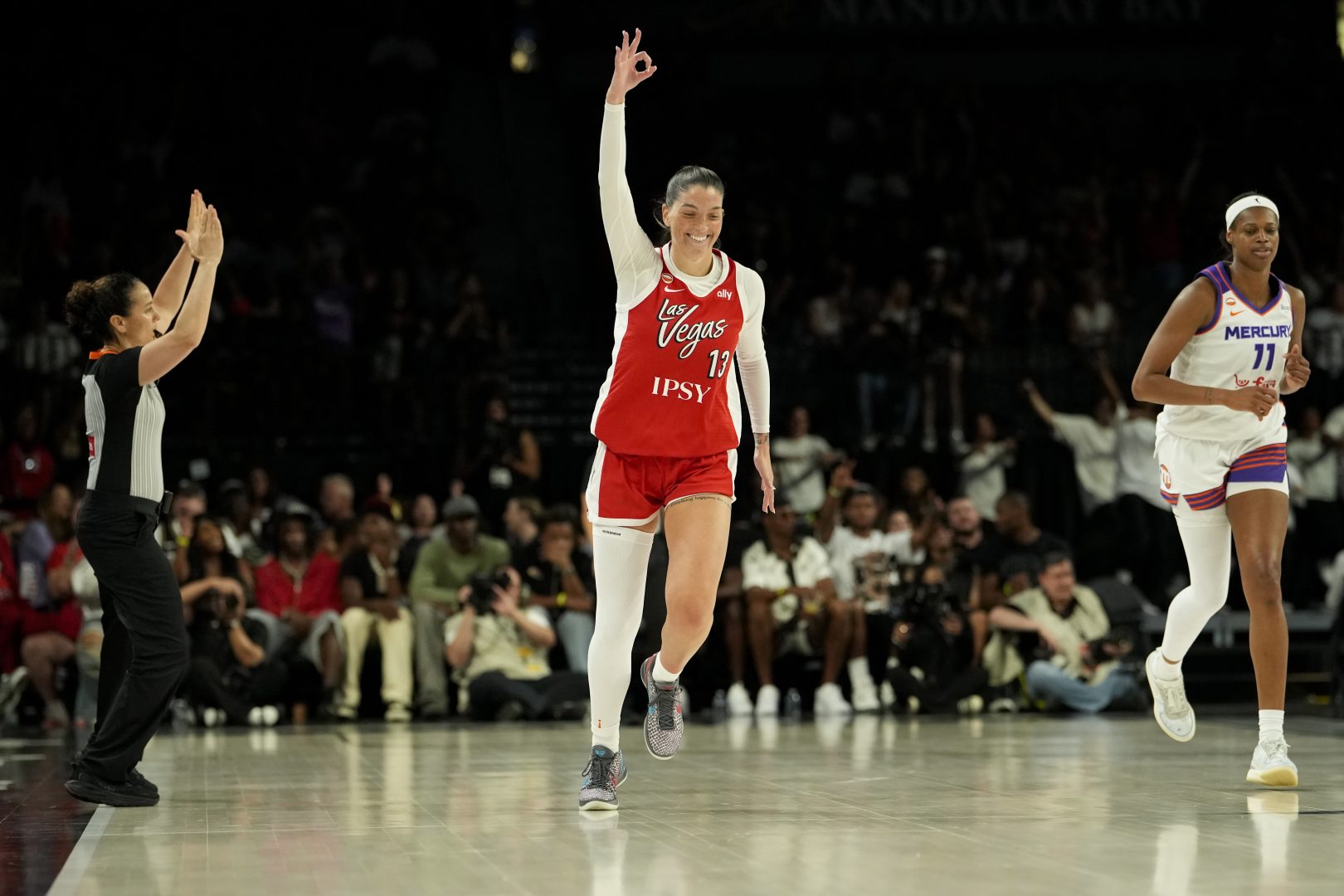 Las Vegas Aces guard-forward Justine Pissott celebrates after scoring during the fourth quarter against the Phoenix Mercury.