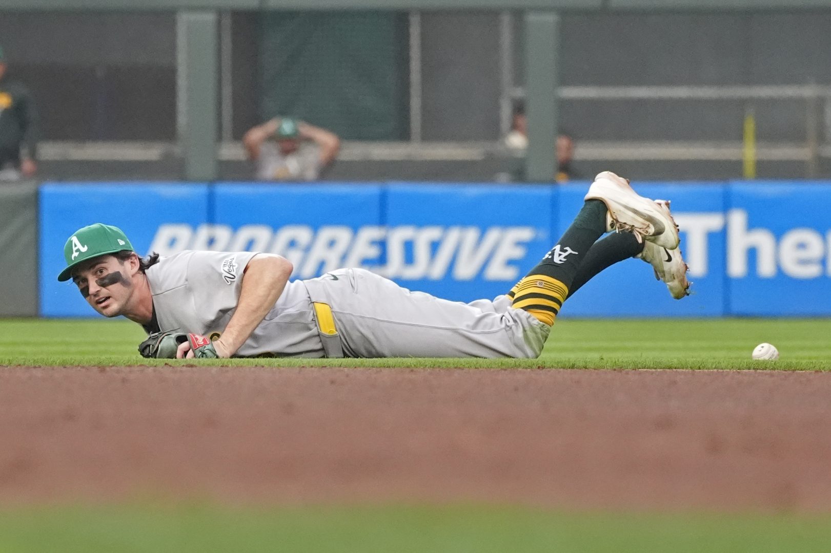 Athletics shortstop Jacob Wilson fields a ball against the Minnesota Twins at Target Field
