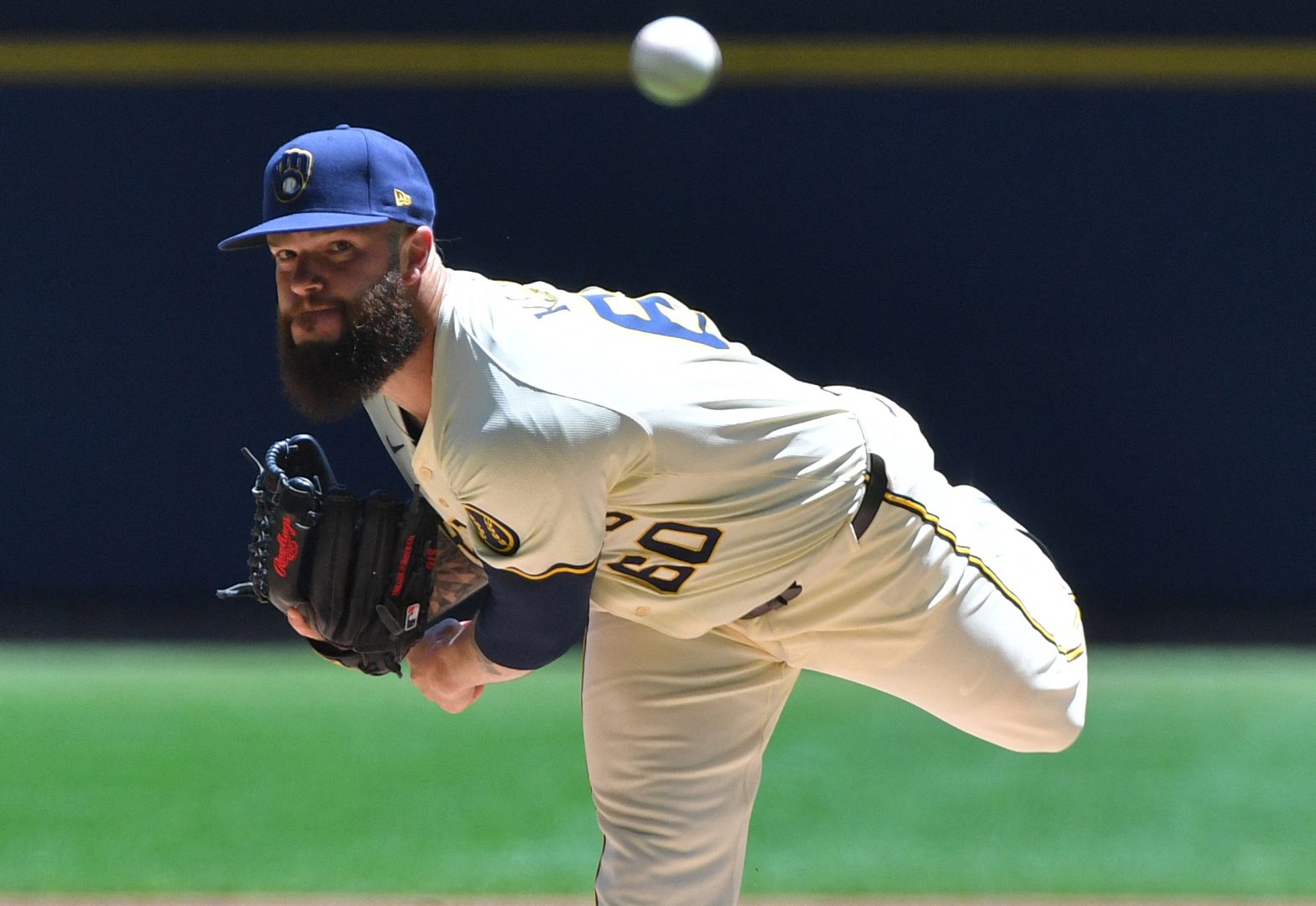 Dallas Keuchel delivers a pitch for the Milwaukee Brewers against the Texas Rangers