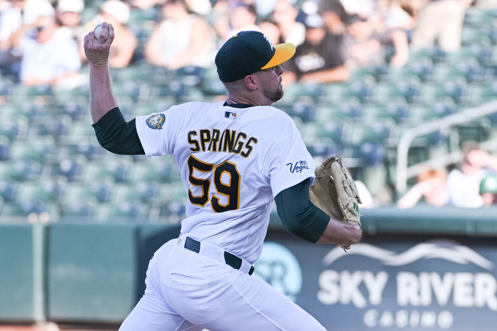 Athletics pitcher Jeffrey Springs delivers against the Detroit Tigers at Sutter Health Park.
