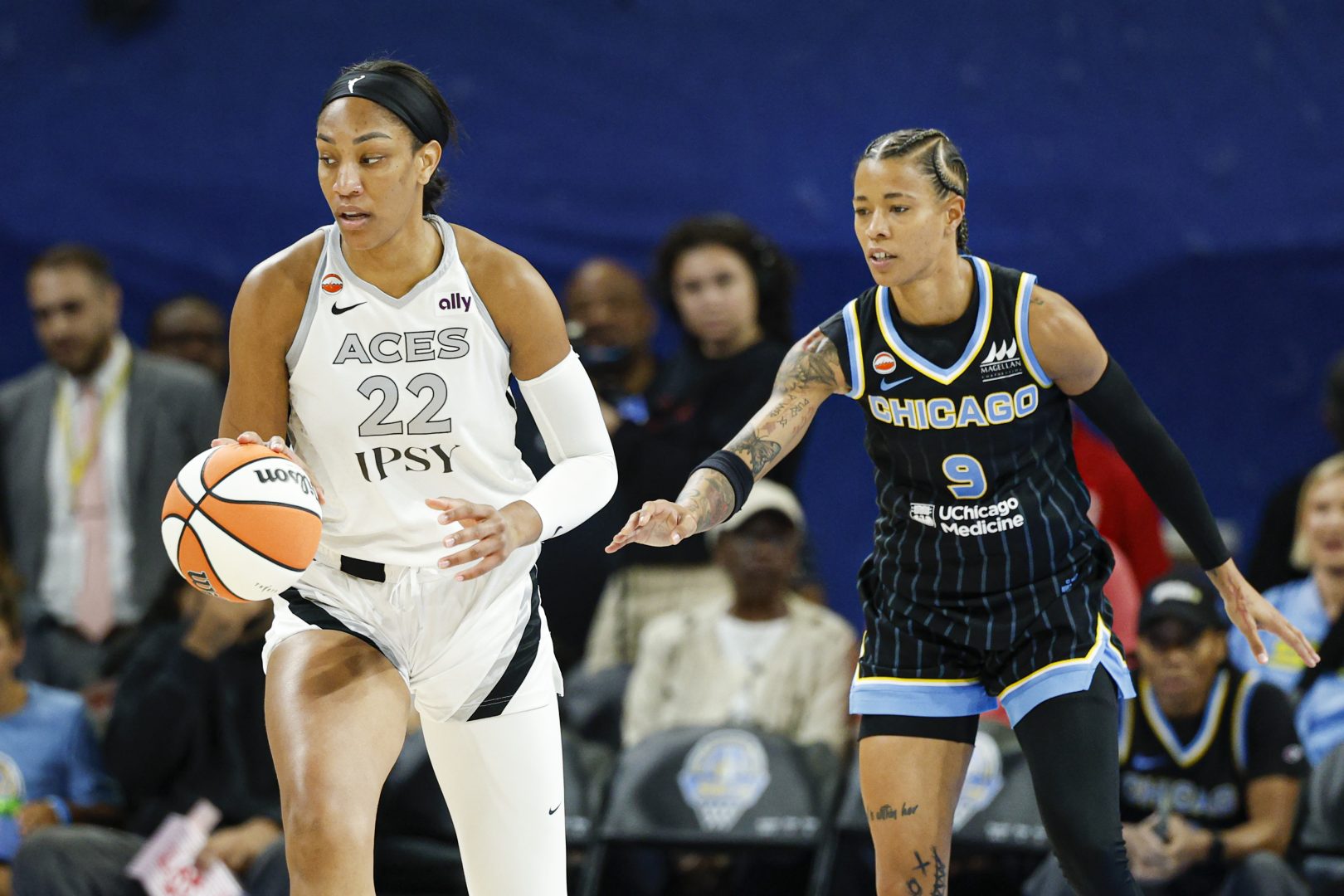 A’ja Wilson is defended by Natasha Cloud during the first half at Wintrust Arena.