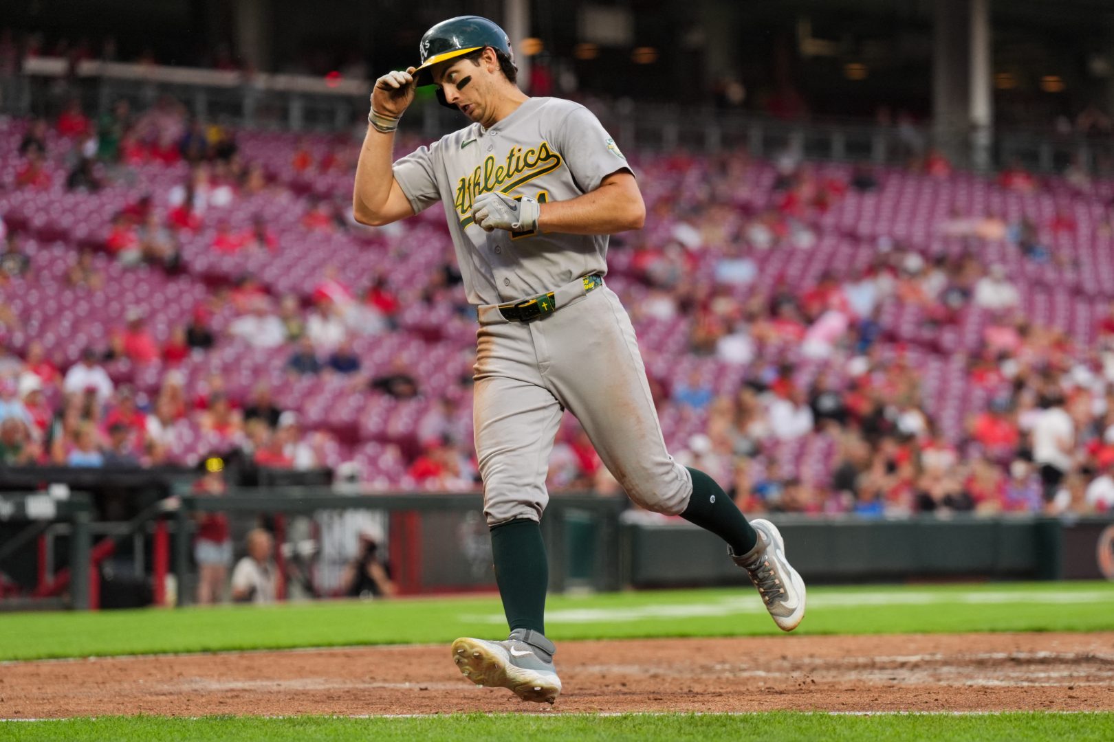 Athletics outfielder Tyler Soderstrom scores against the Cincinnati Reds in the sixth inning