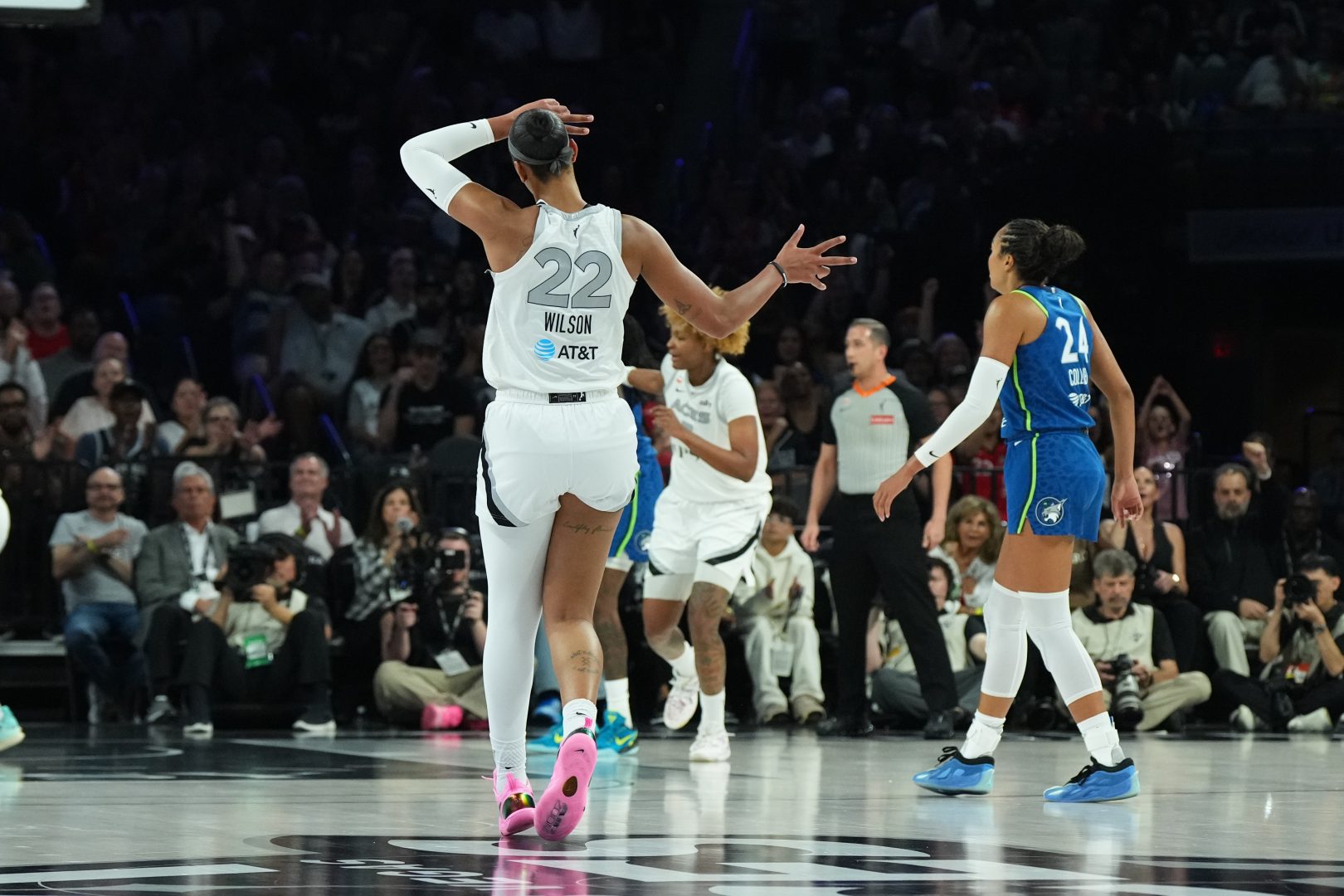 A’ja Wilson celebrates after making a 3-pointer against the Minnesota Lynx in the first quarter.