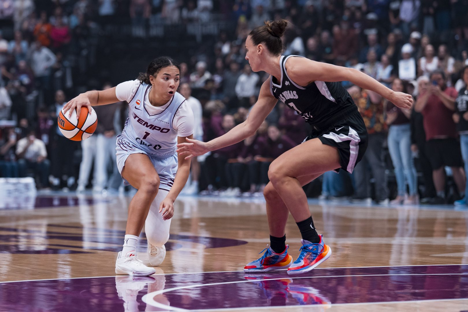 Las Vegas Aces forward Stephanie Talbot defends Toronto Tempo guard Kiki Rice at Rogers Arena.