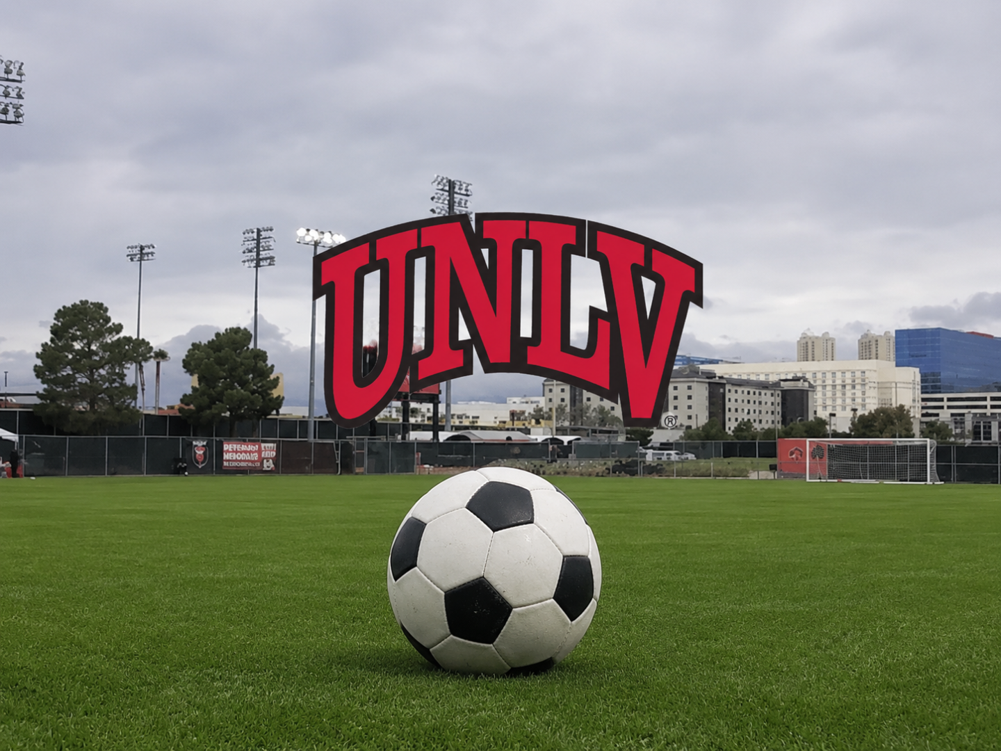UNLV men’s soccer graphic with a soccer ball on the field