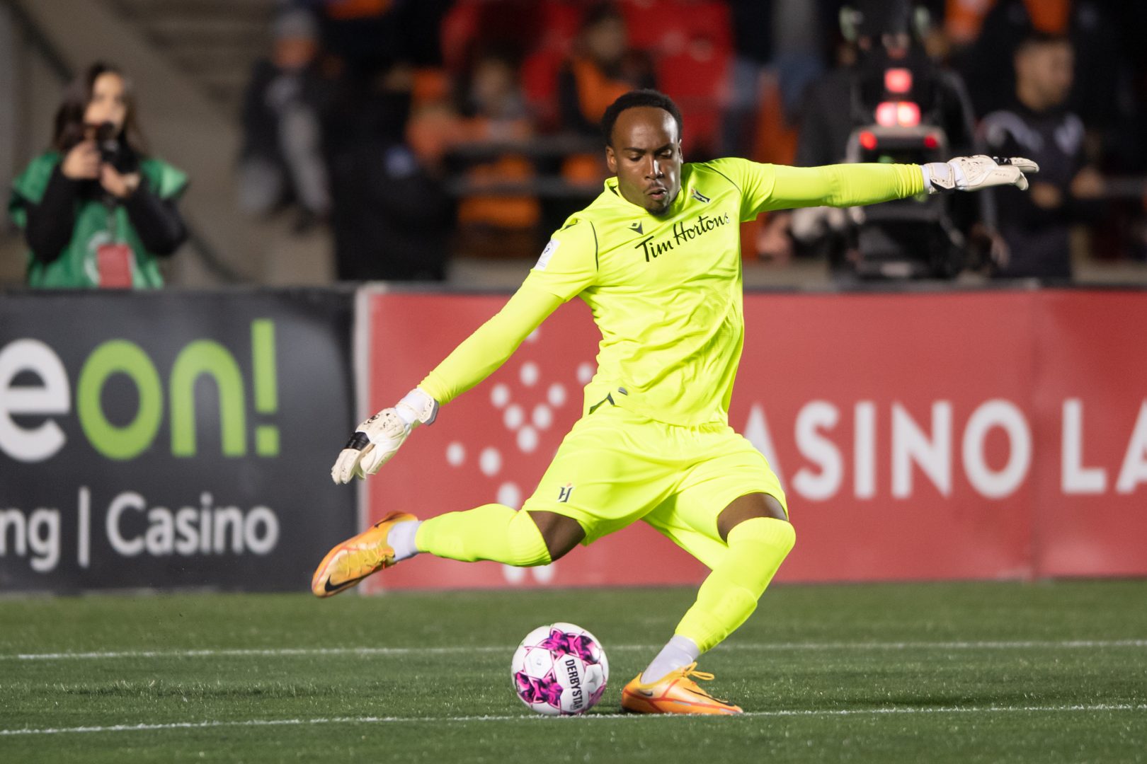 Forge FC goalkeeper Triston Henry kicks the ball against Atletico Ottawa