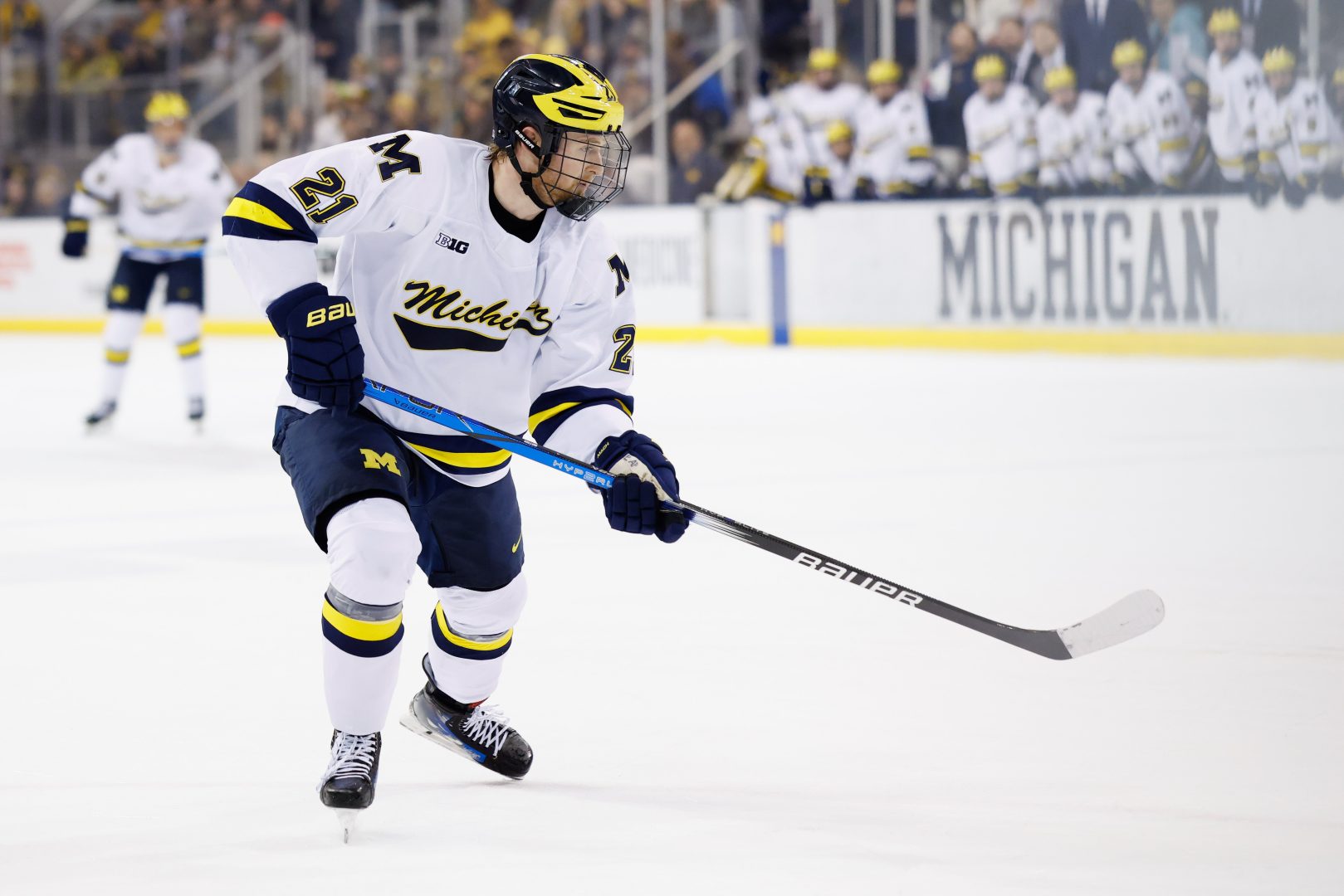 Michigan forward Jackson Hallum skates against Penn State