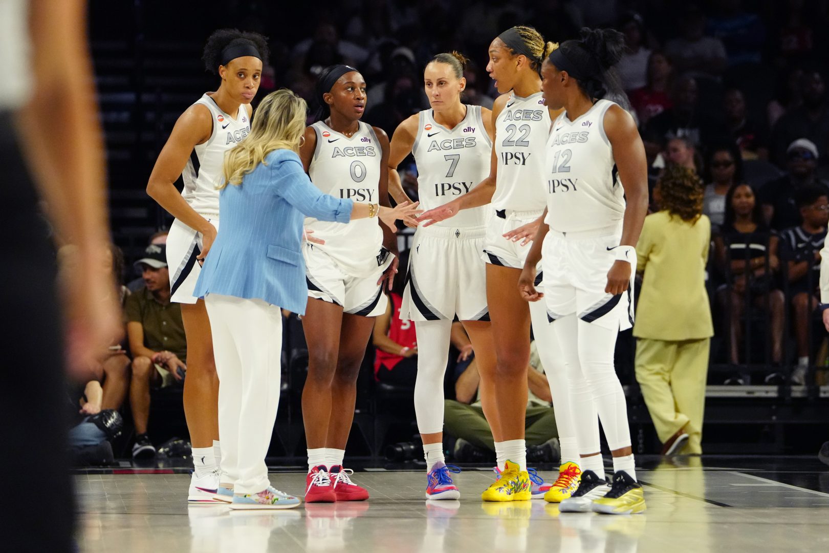 Las Vegas Aces head coach Becky Hammon talks to players during a game against the Minnesota Lynx