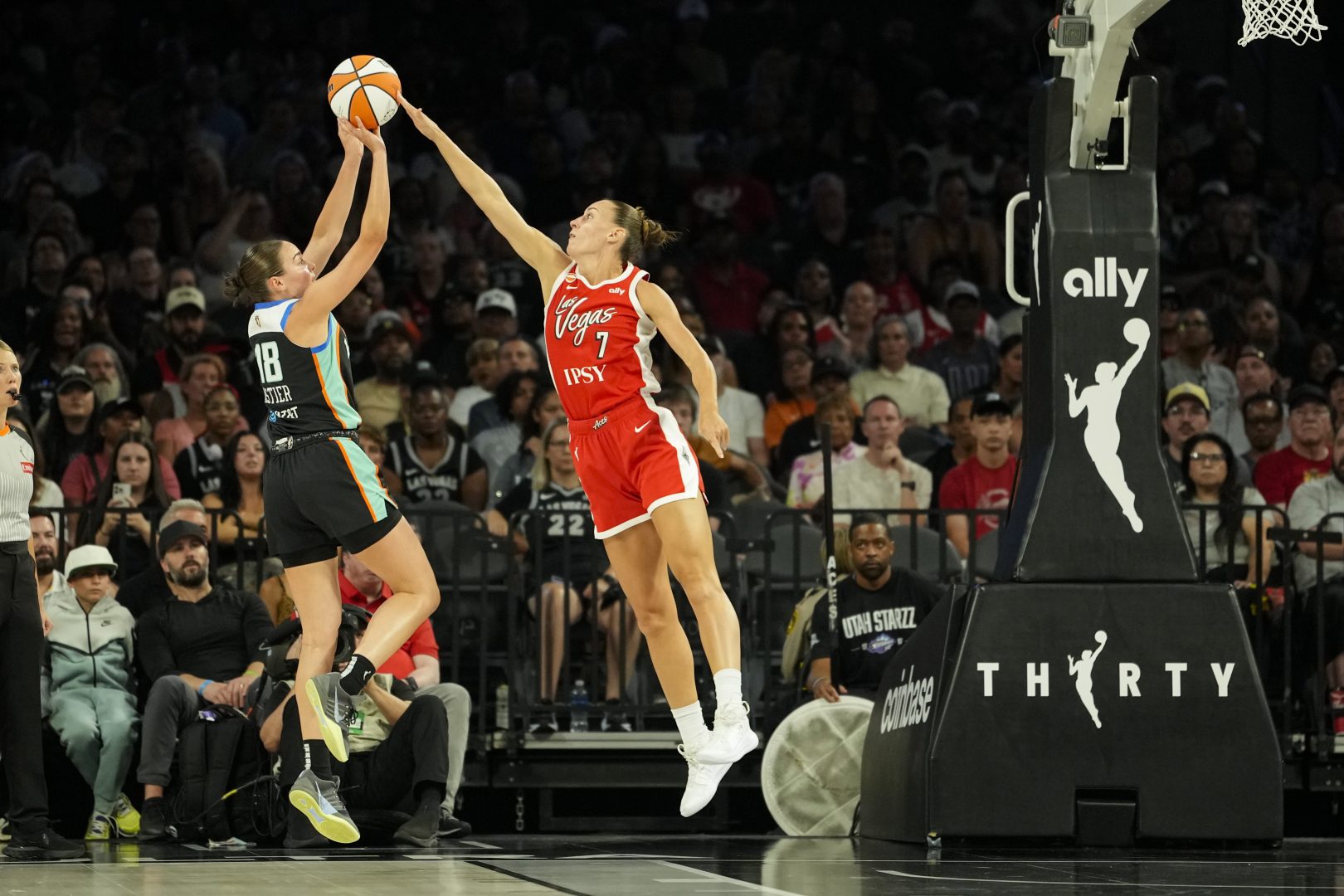 Las Vegas Aces forward Stephanie Talbot blocks New York Liberty guard Pauline Astier