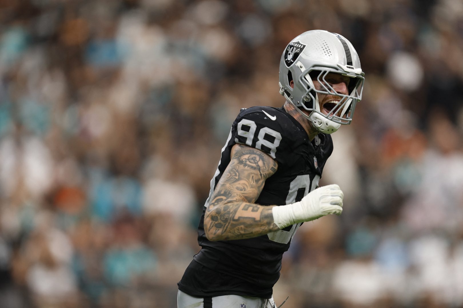 Las Vegas Raiders defensive end Maxx Crosby reacts after sacking Miami Dolphins quarterback Malik Willis