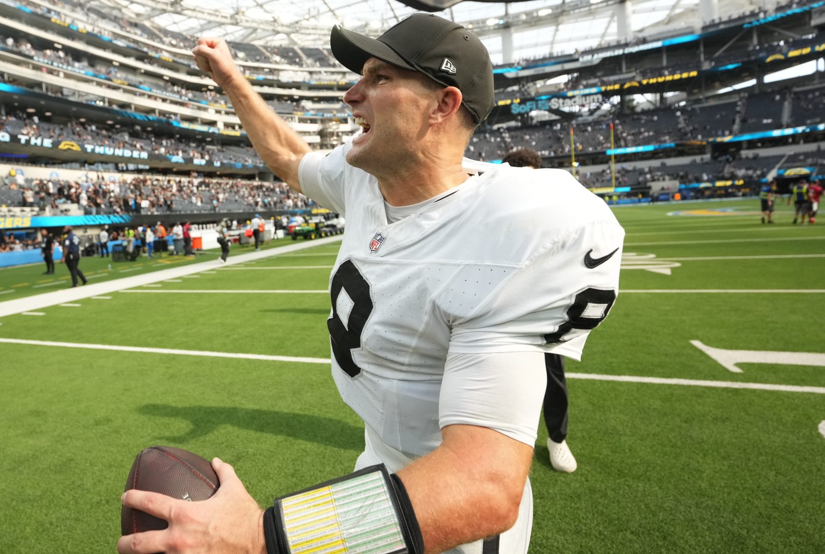 Las Vegas Raiders quarterback Kirk Cousins celebrates after defeating the Los Angeles Chargers