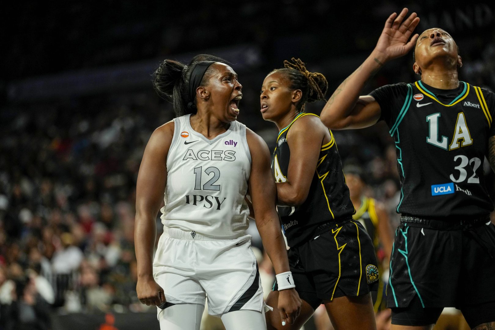 Las Vegas Aces guard Chelsea Gray reacts after scoring against the Los Angeles Sparks
