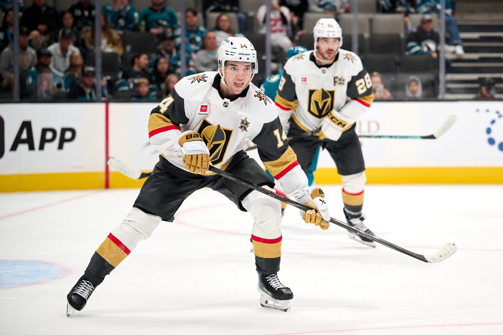 Vegas Golden Knights defenseman Ville Heinola and center Tanner Laczynski skate against the San Jose Sharks