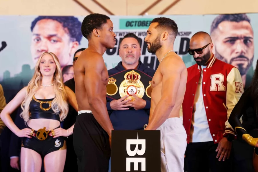 Floyd Schofield Jr. and Lucas Bahdi face off during the weigh-in before their WBA lightweight title fight.